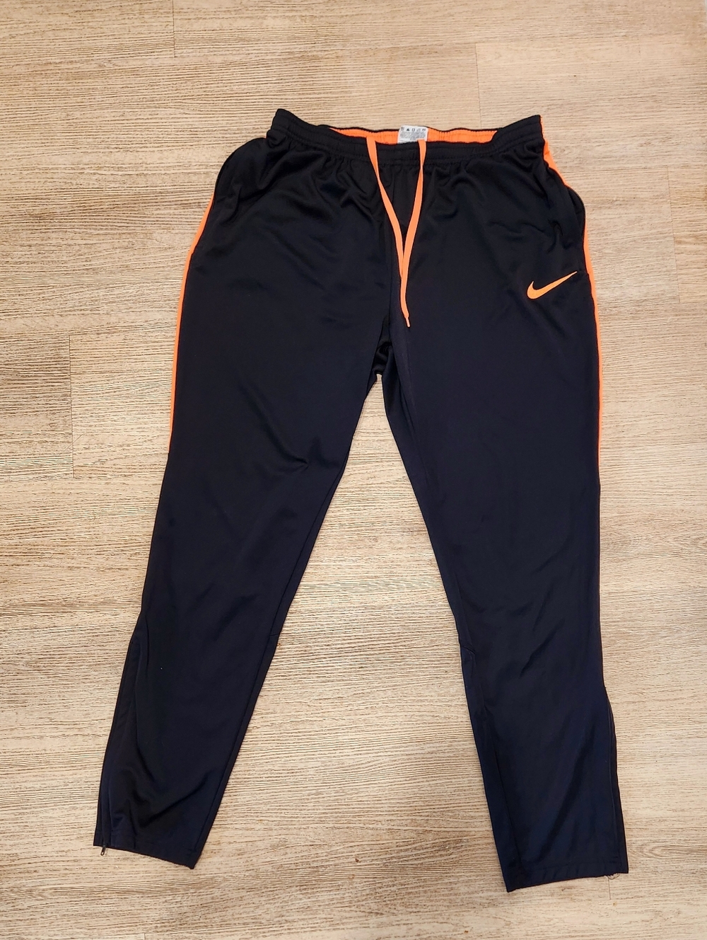Nike Black Track Pants with Orange Accents